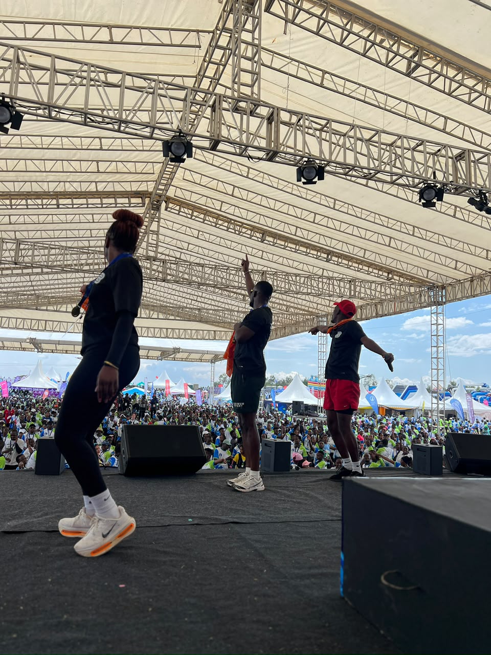 Dance Connect stage overlooking the Standard Chartered Marathon 2025 crowd